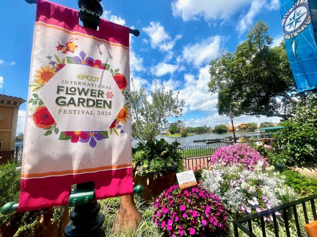 EPCOT Flower and Garden Festival sign with flowers